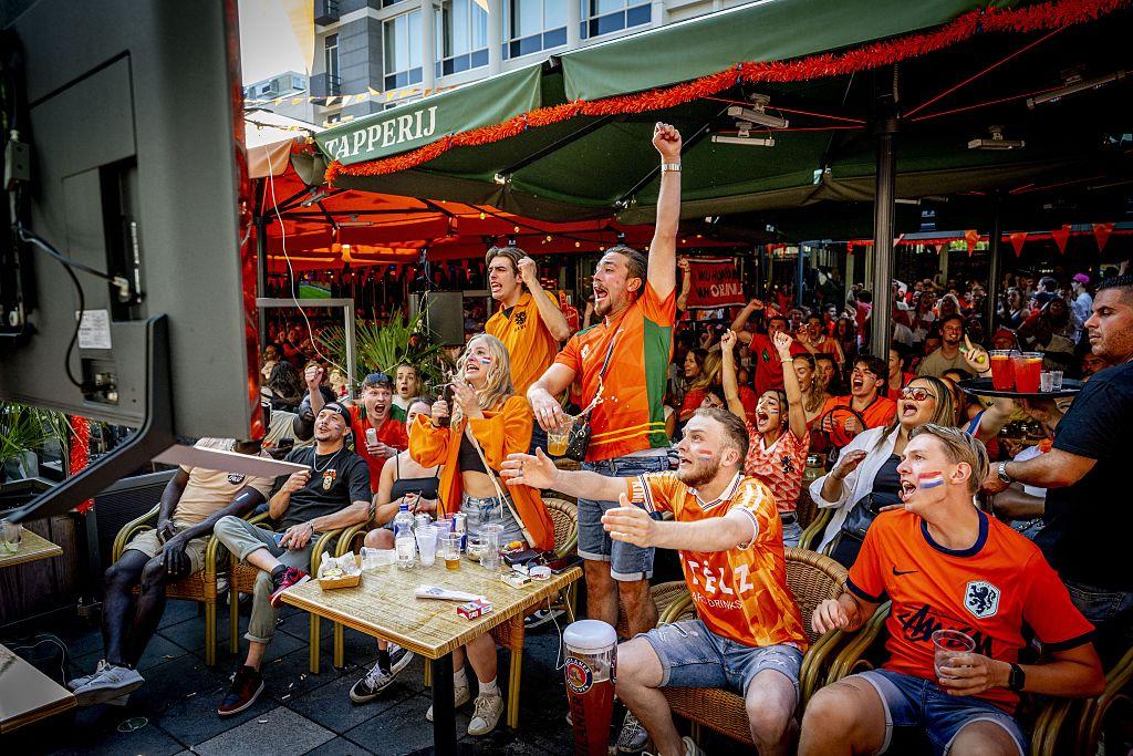 Cafés in Amsterdam, Rotterdam and Moroccan cities becoming community stages for the split-heart World Cup match
