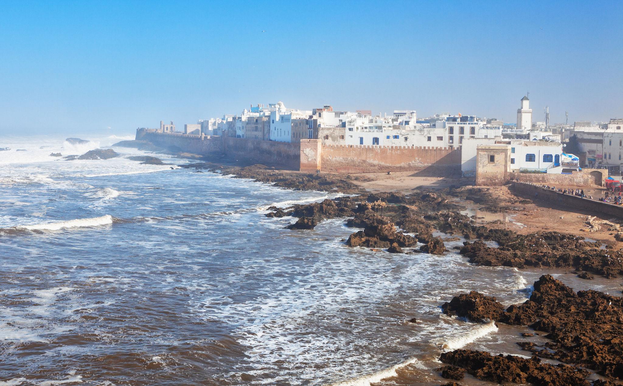 Essaouira Morocco grilled sardines travel moment blue boats harbour sea wind white walls