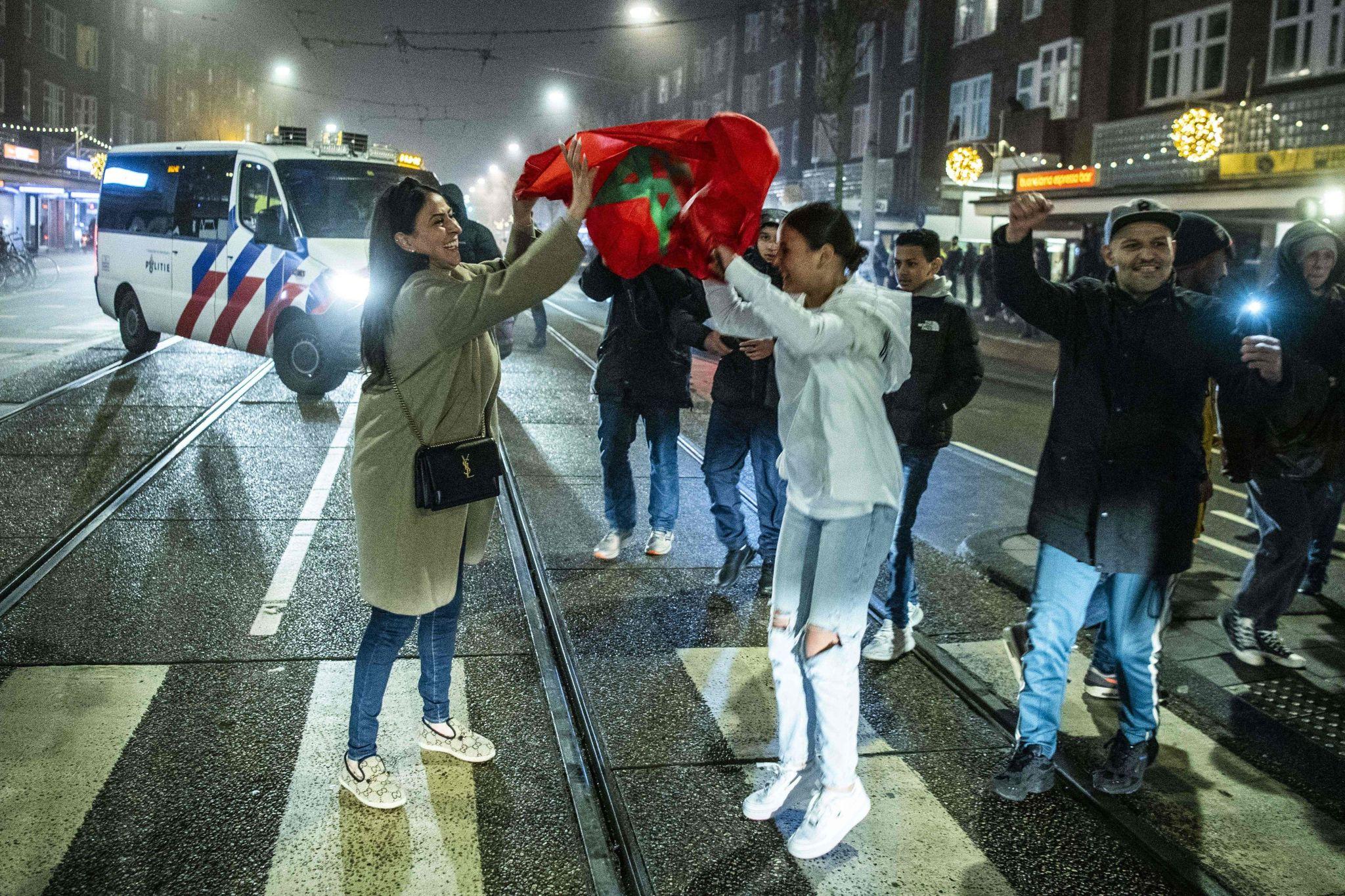 Moroccan diaspora fans abroad celebrating the Atlas Lions in European streets