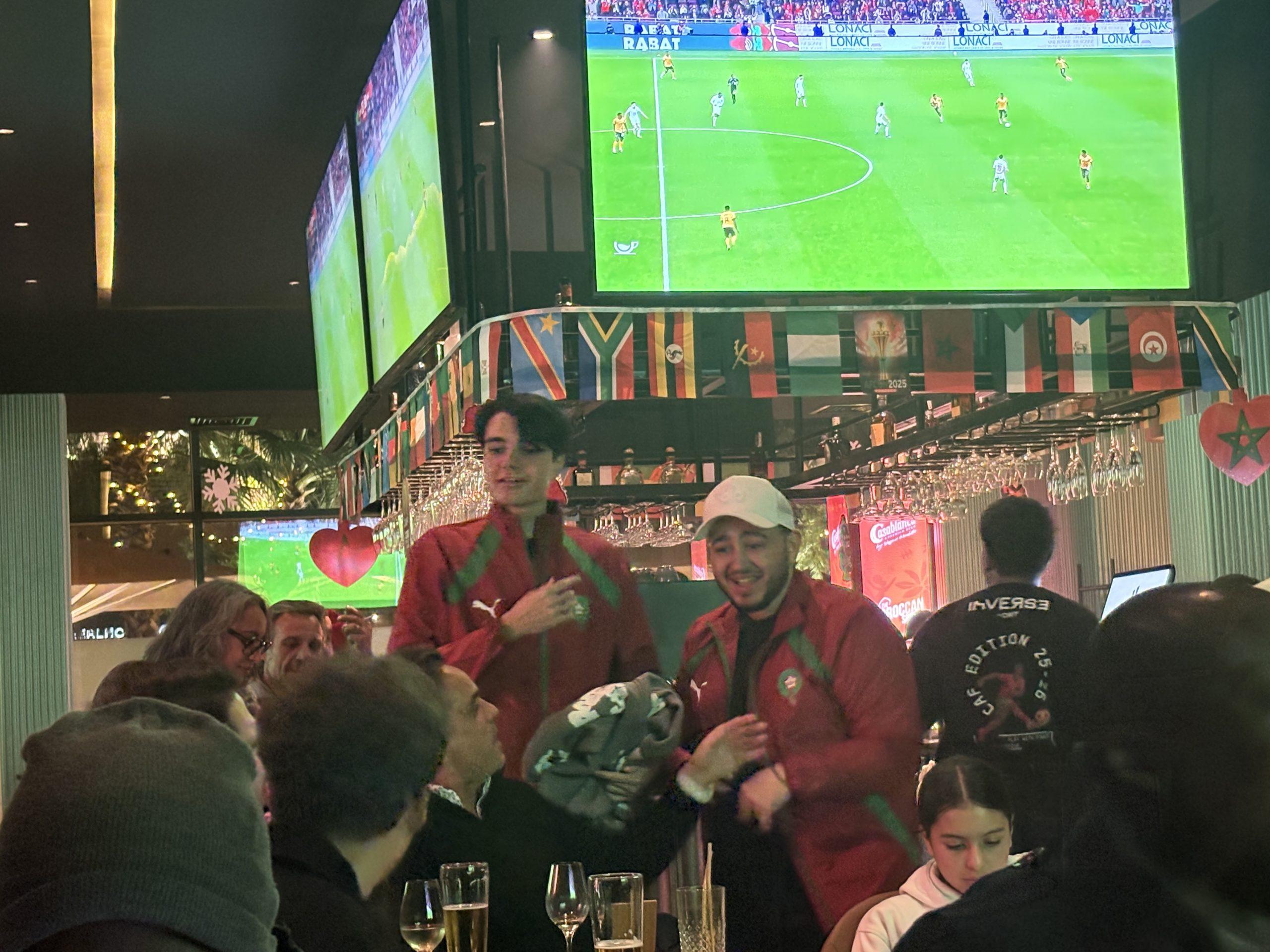 Full house matchday cafe Morocco Netherlands Morocco fans viewing business rush screen big match