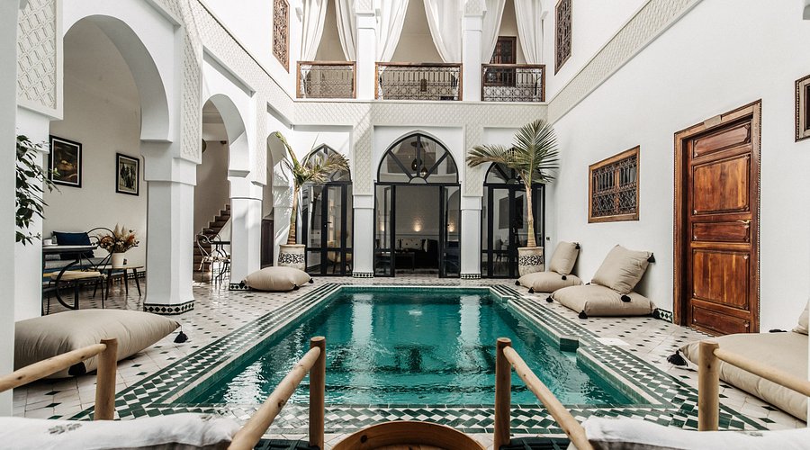 Morocco riads small stays big memories courtyard fountain tiled walls rooftop Marrakech Fez Essaouira
