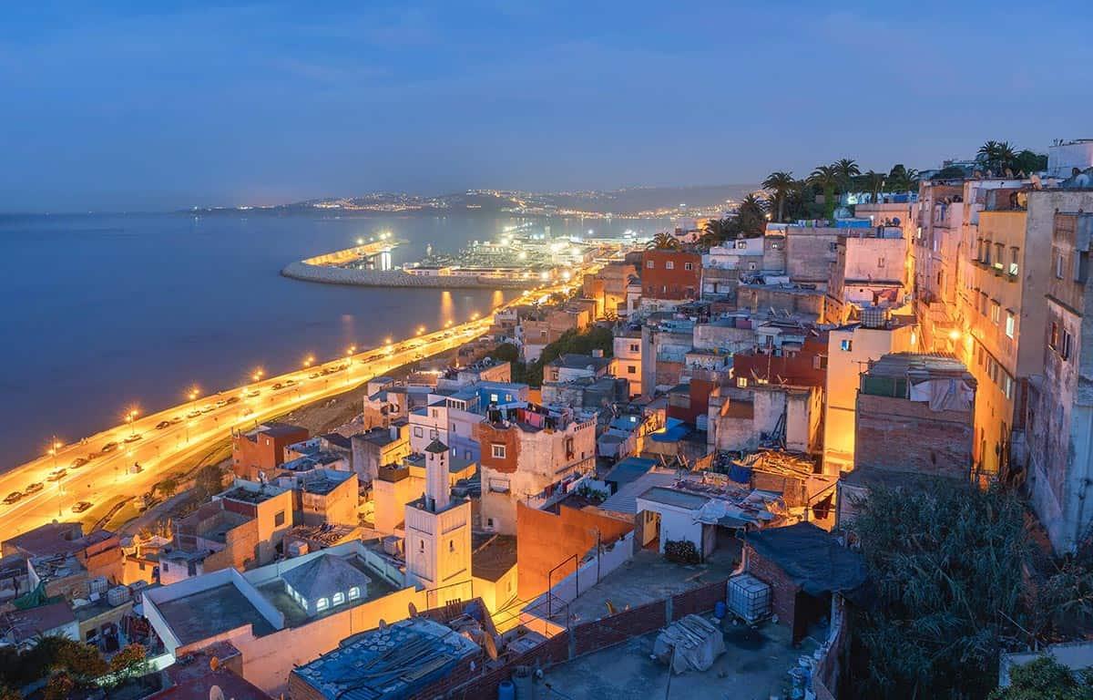 Tangier rooftop dining coastal mood evening sea views hills understated stylish Morocco north