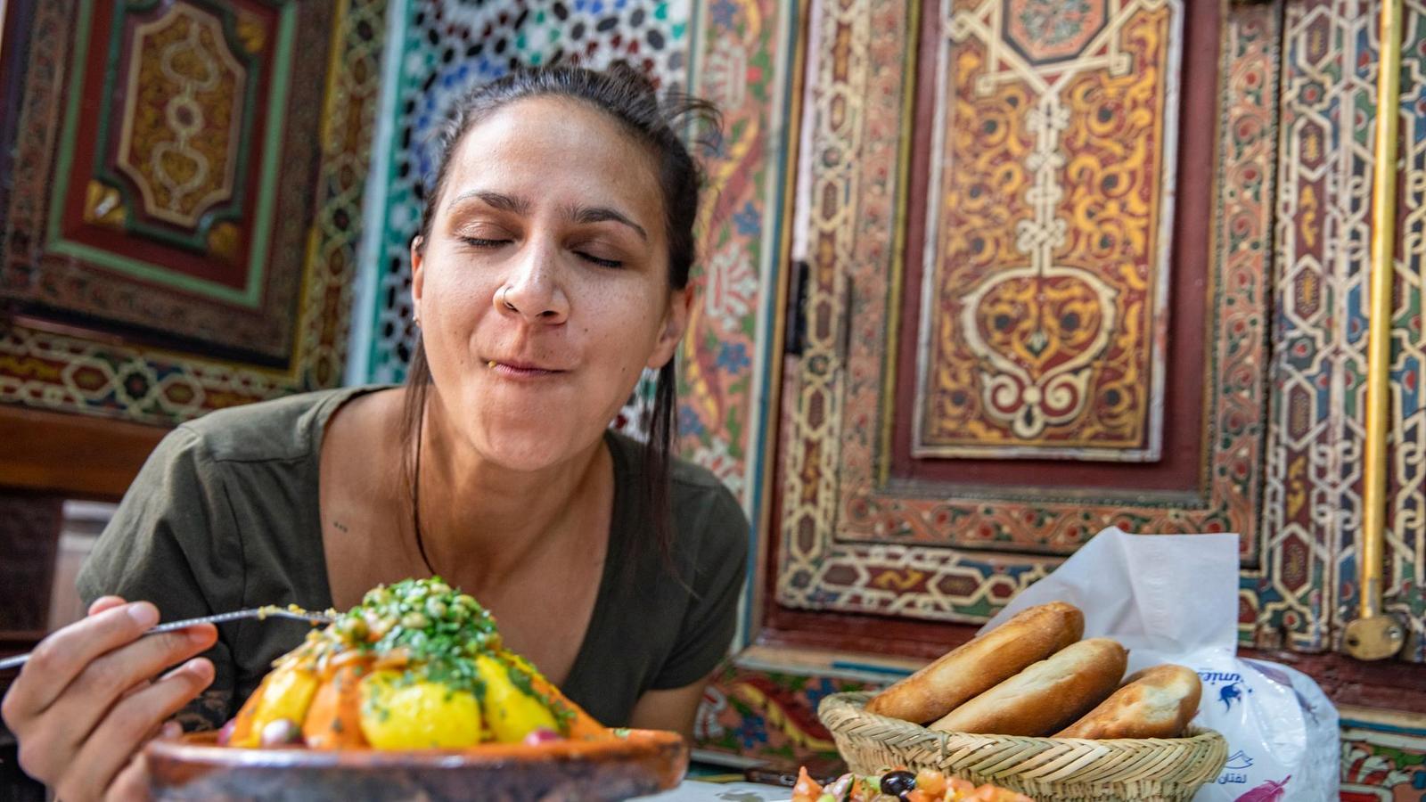 Tourists discovering the Friday couscous ritual and its cultural depth in Morocco