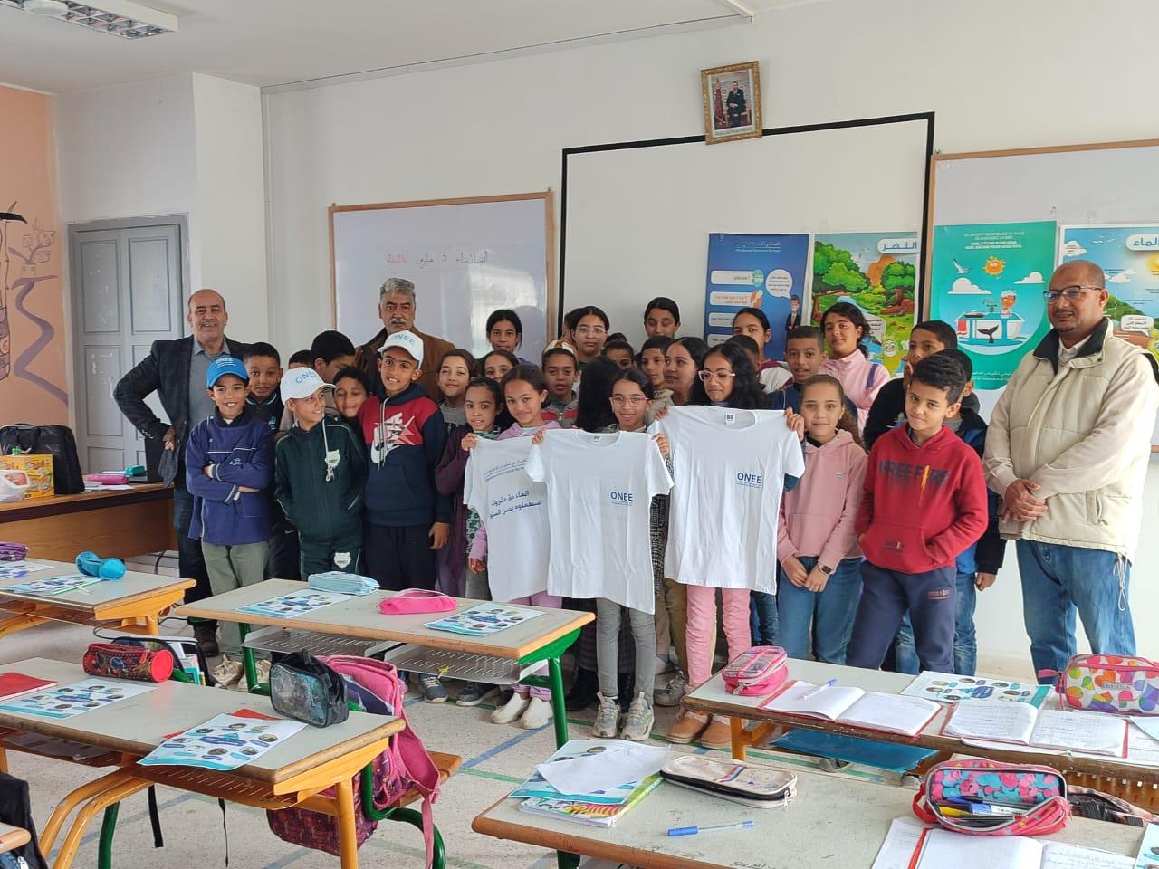 Moroccan children learning water conservation as part of daily family life