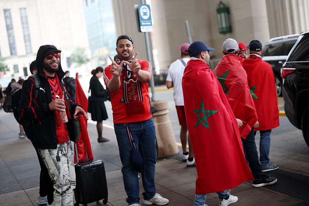 Morocco flags become part of look World Cup Houston July 4 wrapped shoulder car window fan zone identity