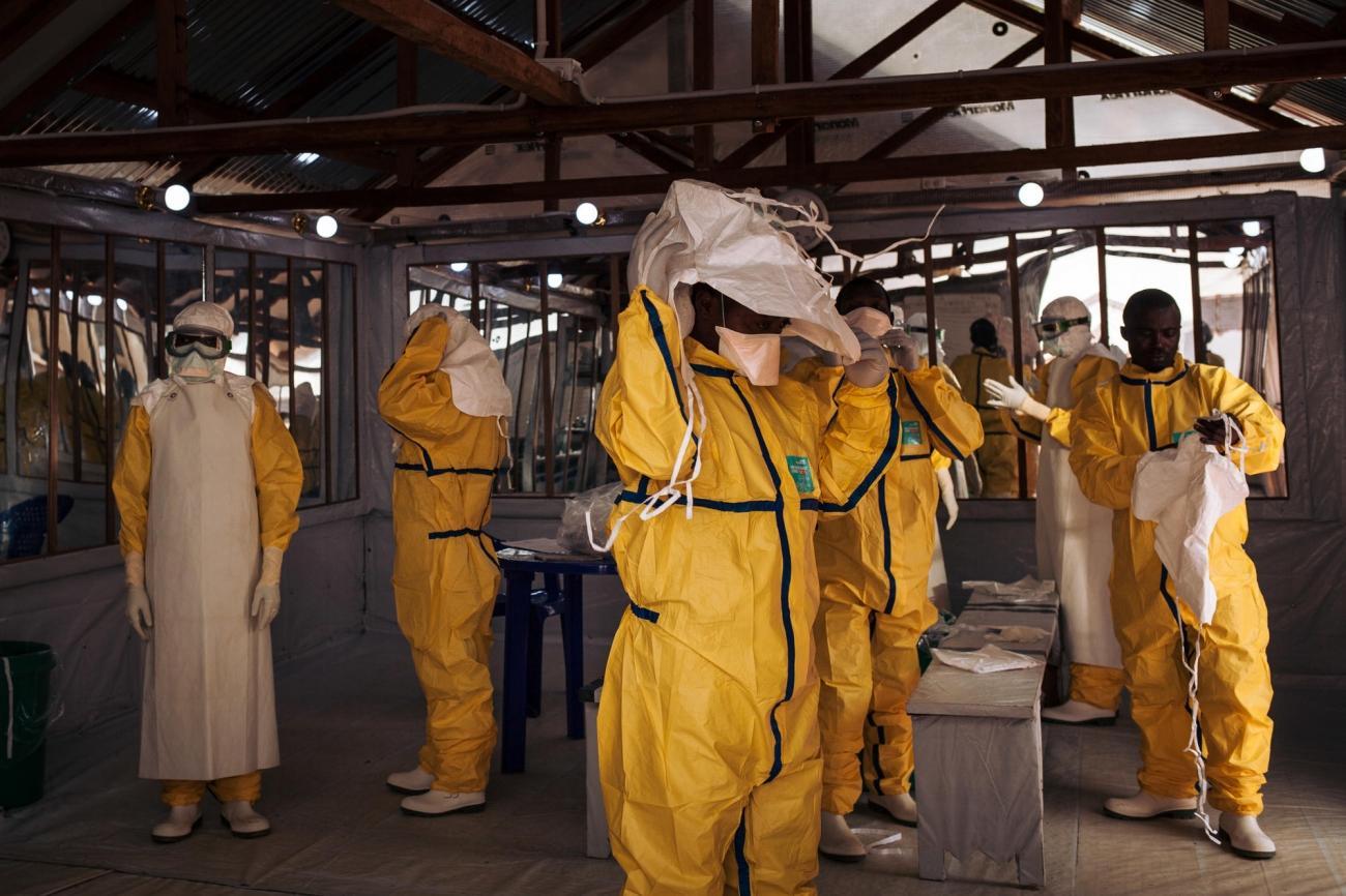 Humanitarian workers face a special risk and heightened scrutiny under outbreak travel rules