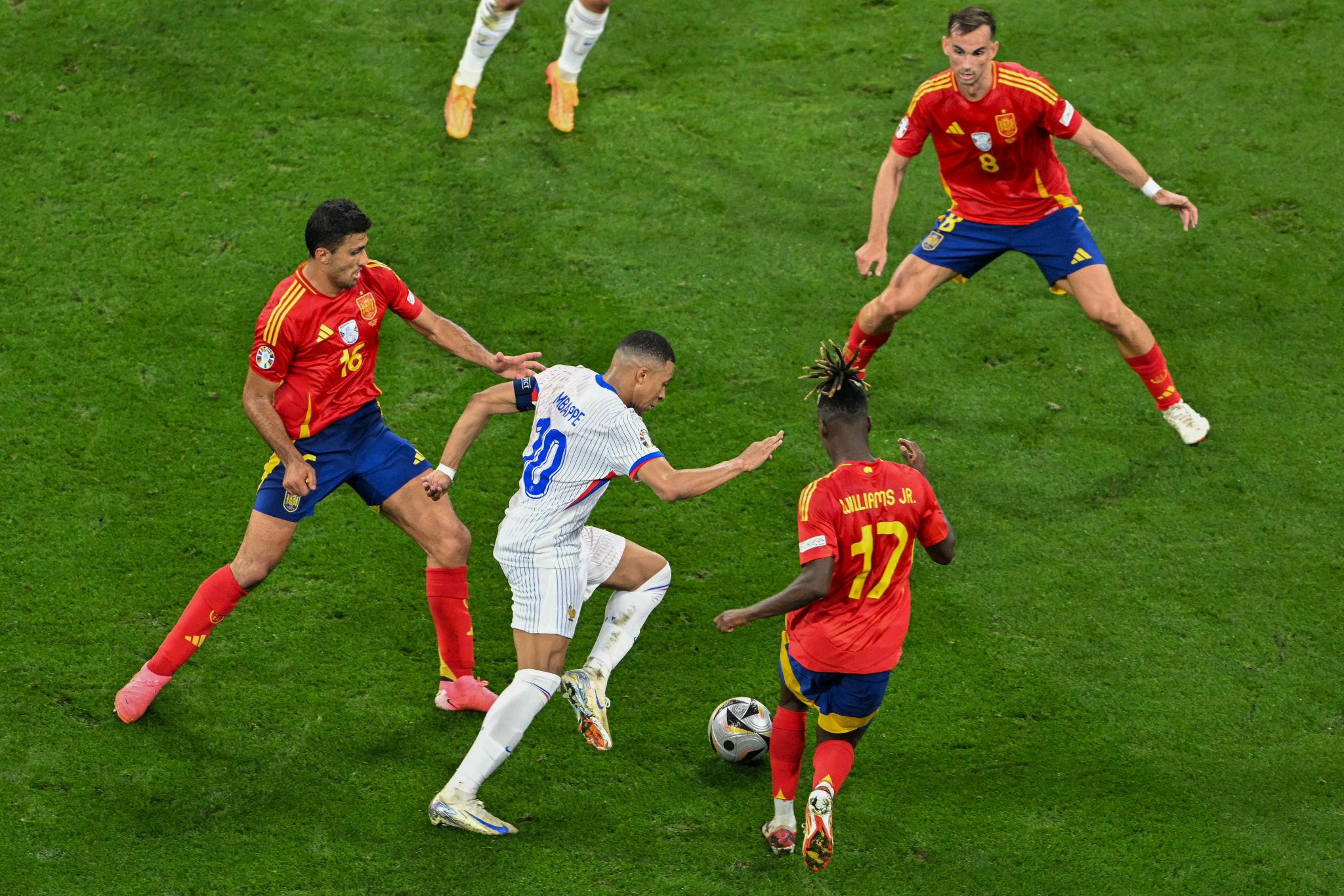 Spain’s defence containing Kylian Mbappé during the World Cup semifinal against France