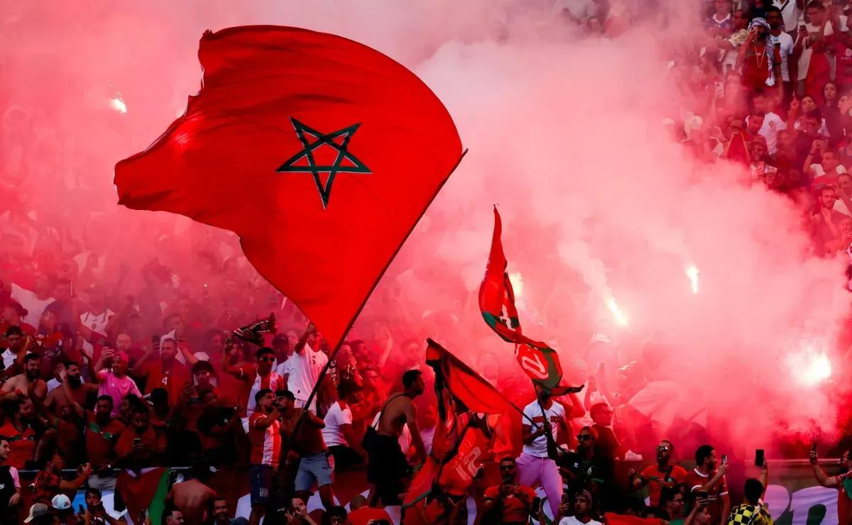 Morocco fans add their own show songs drums flags scarves group photos phone lights red green culture
