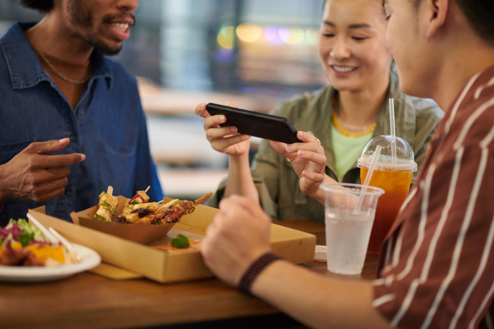 Social media food part story World Cup fans film meals drinks stadium cups queues trucks post content
