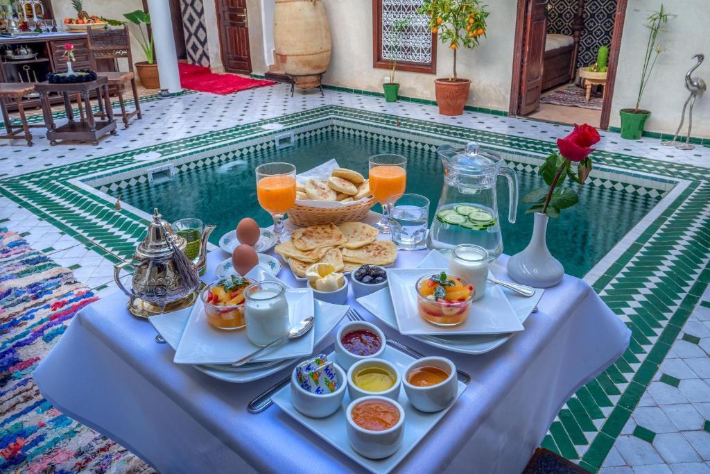 The riad setting turns a Moroccan breakfast into a cinematic courtyard scene