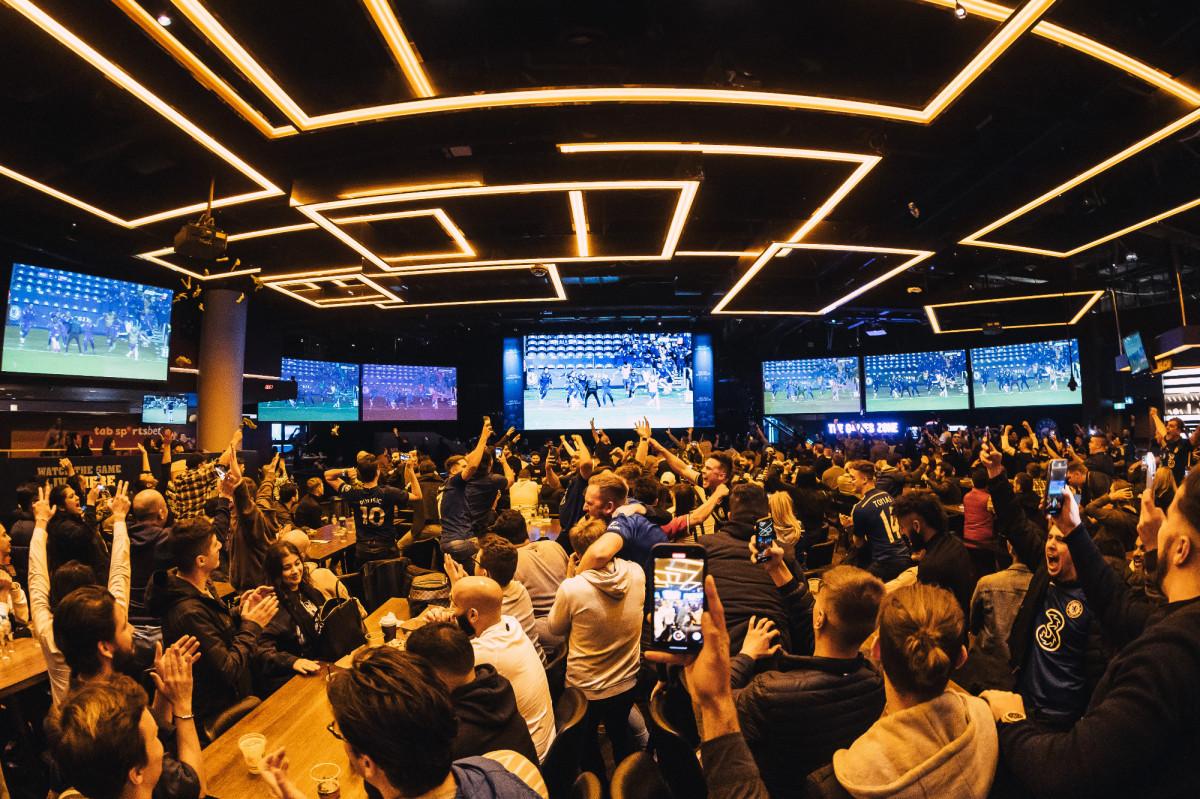Watch spots mini stadiums Houston Morocco Canada World Cup screens restaurants bars tables crowd knock-out