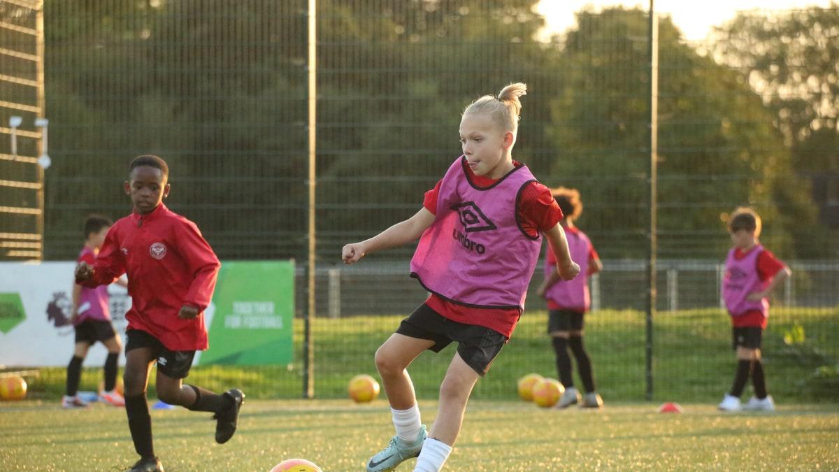 Young fans copy pink boots World Cup local pitch academy school five-a-side football fashion spread